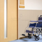 Healthcare: Watermarked Wheelchair in Hallway
